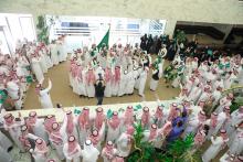 The employees of the General Authority for Statistics celebrate the 89th National Day